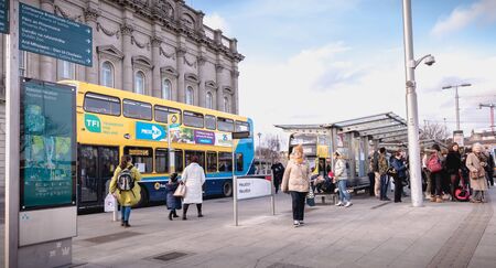 Dublin, Ireland - February 13, 2019: Double decker Irish bus that parks in front of Heuston train...