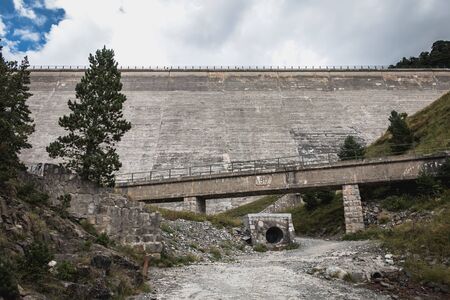 Saint Lary Soulan, France - August 22, 2018: Architecture detail of the Oule hydrolic dam on a summer dayのeditorial素材