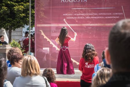 Braga, Portugal - May 23, 2018: People attending a show in the historic city center decorated for the Braga Romana City Day on a spring dayのeditorial素材