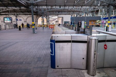 Dublin, Ireland - February 13, 2019: Access turnstile at the platform at Heuston station where...
