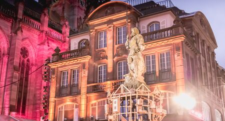 Mulhouse, France - December 23, 2017: View of a street in downtown Mulhouse decorated for Christmas on a winter dayのeditorial素材