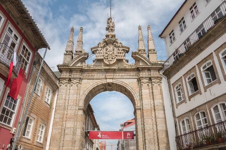 Braga, Portugal - May 23, 2018: People walking in the historic city center decorated for the Braga Romana city festival on a spring dayのeditorial素材