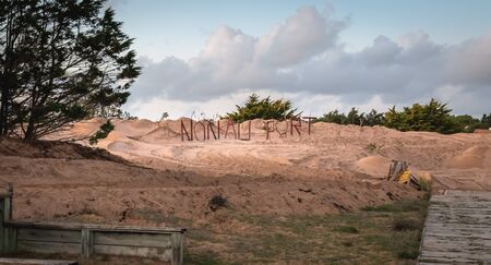 Bretignolles sur Mer, France - October 9, 2019: No to the Port in French made in log on a ZAD (Acronym of Zone to Defend) protest zone against the construction of the boat harborのeditorial素材