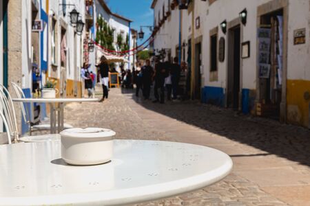 Obidos, Portugal - April 12, 2019: Architectural detail and street feel in the historic downtown...