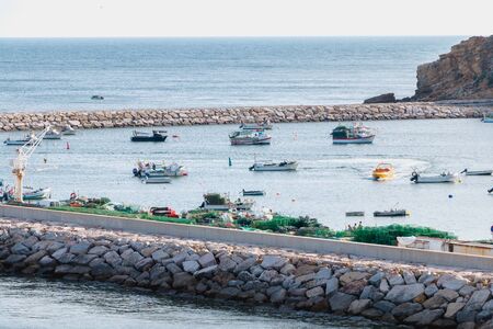 Albufeira, Portugal - May 3, 2018: Top view of the marina with its fishing boats and tourist boats at anchor on a spring dayのeditorial素材