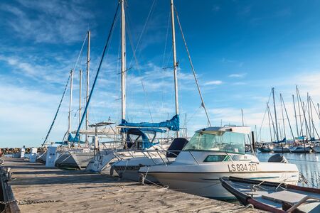 Marseillan, France - December 30, 2018: Pleasure boat docked in the small port of Marseillan on a winter dayのeditorial素材