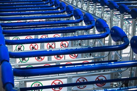 Faro, Portugal - May 3, 2018: carry cart outside Faro international airport available to travelers...