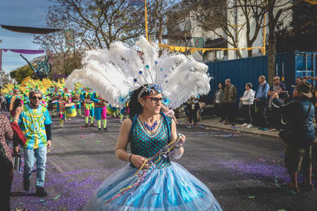 Loule, Portugal - February 25, 2020: dancers parading in the street in front of the public in the...