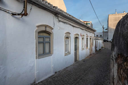 Loule, Faro, Portugal - February 25, 2020: architectural detail of pretty little typical house in the city center on a winter dayのeditorial素材