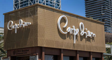 Barcelona, Spain - June 21, 2017: View of the sign of the luxury restaurant CarpeDiem in the city harbor on a summer dayのeditorial素材