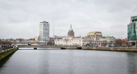 Dublin, Ireland - February 12, 2019: mix of modern and old architecture along the Liffey River in the city center on a winter dayのeditorial素材