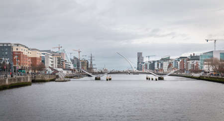 Dublin, Ireland - February 12, 2019: mix of modern and old architecture along the Liffey River in...