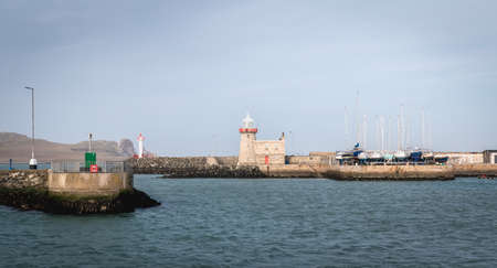 Howth near Dublin, Ireland - February 15, 2019: view of the fishing port of the city where are parked professional fishing boats on a winter dayのeditorial素材
