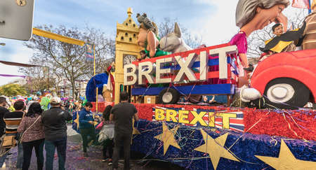Loule, Portugal - February 25, 2020: BREXIT float parading in the street in front of the public in the parade of the traditional carnival of Loule city on a February dayのeditorial素材