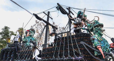 Loule, Portugal - February 25, 2020: Float parading in the street in front of the public in the...