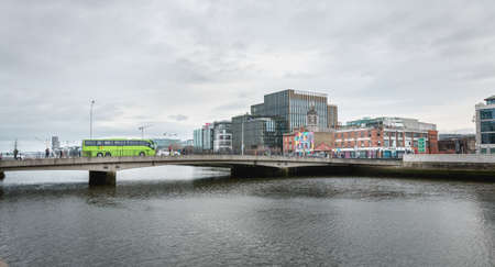 Dublin, Ireland - February 12, 2019: mix of modern and old architecture along the Liffey River in...
