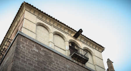 Toledo, Spain - April 27, 2018: Architecture of typical apartment building in historic city center on a spring dayのeditorial素材