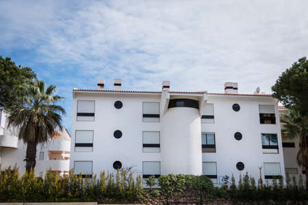Vilamoura, Portugal - May 2, 2018: Tourist rental building with typical Algarve swimming pool on a...