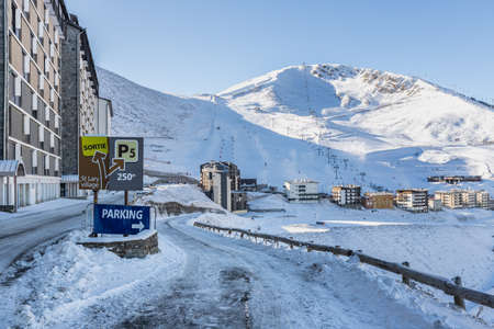 Saint Lary Soulan, France - December 26, 2020: mountain chalet in a snowy ski resort on a winter...