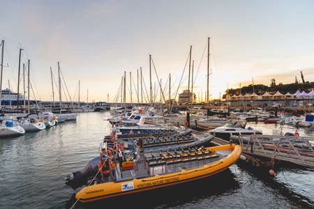 Funchal, Madeira, Portugal - December 31, 2021: View of Funchal marina where people gather in the...