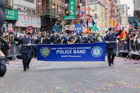 New York, Chinatown, USA - February 12, 2023: New York City Police Department Police Band marching past the public during the Chinatown Chinese New Year 2023 celebrationのeditorial素材