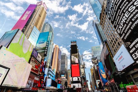 New York, Manhattan, USA - February 15, 2023: View of Times Square with advertising screens and...