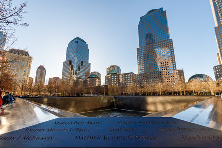 New York City, USA - February 11, 2023 - World Trade Center Memorial, Ground Zero. The memorial was...
