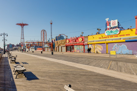 New York City, Brooklyn, USA - February 18, 2023: street atmosphere in front of closed Coney Island attractions with people walking on a winter dayのeditorial素材