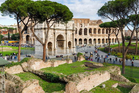Rome, Italy - December 27, 2023: view of the Coliseum of Rome visited by tourists in the historic city center on a winter dayのeditorial素材