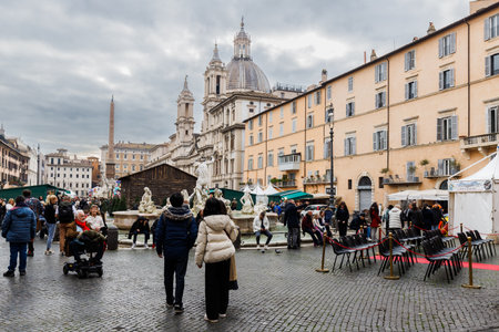 Rome, Italy - December 29, 2023: view of Navona Square and its fountains visited by tourists in the historic city center on a winter dayのeditorial素材
