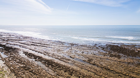 Drone view of Ragounite beach in Jard sur Mer, Vendee, France on a spring day with blue skyの写真素材