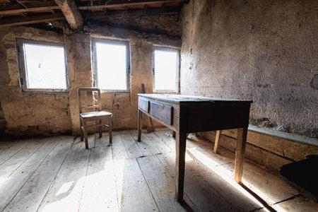 interior of an old abandoned stone house typical of northern portugal - urbex