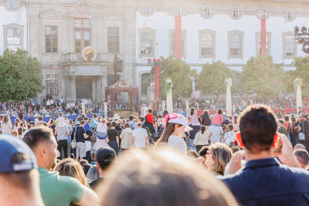 Braga, Portugal - May 26, 2024: Crowd of spectators watching a show in front of the town hall during the Braga Romana event on a beautiful spring dayのeditorial素材