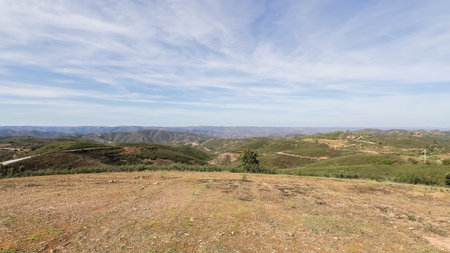 View of the highest point in the Eastern Algarve, Alcaria do Cume, 525 meters above sea level. Near Santa Catarina da Fonte do Bispo, Tavira, Portugal on an autumn dayの写真素材