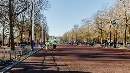 London, United Kingdom - January 3, 2025: Crowds heading towards Buckingham Palace to witness the Changing of the Guard on a winter dayのeditorial素材