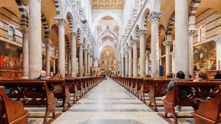 Pisa, Tuscany, Italy - January 04, 2024: Interior of Pisa Cathedral visited by tourists on a beautiful winter dayのeditorial素材