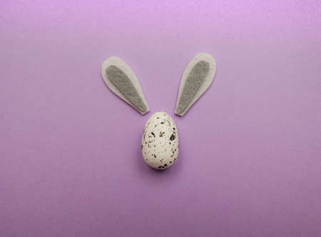 White Easter egg with rabbit ears on top. Spring holidays conceptの写真素材