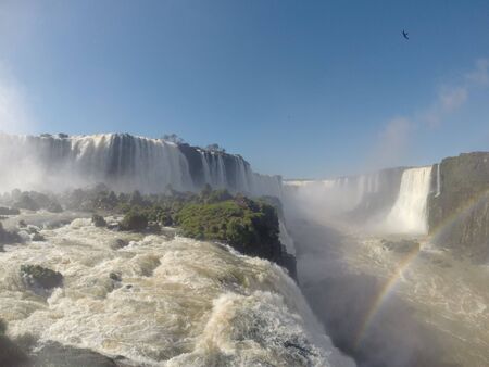 Iguazu Falls or Iguacu Falls are waterfalls of the Iguazu River on the border of the Argentine province of Misiones and the Brazilian state of Parana. Together, they make up the largest waterfall system in the world. The falls divide the river into the upper and lower Iguazu.の写真素材