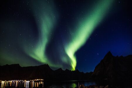Northern lights above Reine in Lofoten islands in Norwayの写真素材