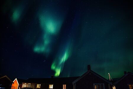 Northern lights above Reine in Lofoten islands in Norwayの写真素材