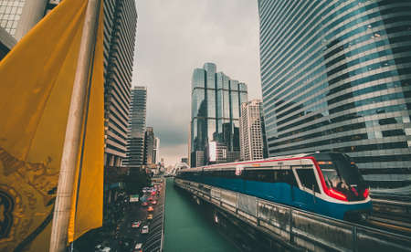 Chong Nonsi skywalk arch bridge at sky train station BTS in Sathorn business district in Bangkok Thailandの写真素材