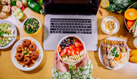 Healthy food clean eating selection: fruit, vegetable, seeds, superfood, leaf vegetable and mediterranean dishes. Detox and clean diet. Foods high in vitamins, minerals and antioxidants.の写真素材