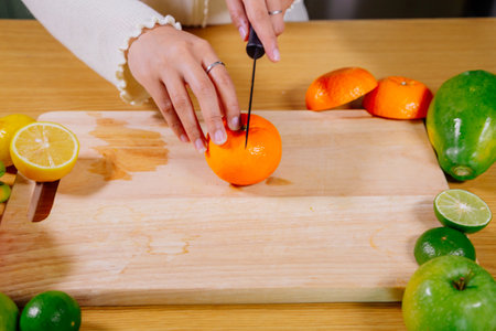 Asian girl cooking healthy vegetarian and vegan food, vegetables and fruits in the kitchen, healthy lifestyleの写真素材