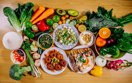 Healthy food clean eating selection: fruit, vegetable, seeds, superfood, leaf vegetable and mediterranean dishes. Detox and clean diet. Foods high in vitamins, minerals and antioxidants.の写真素材