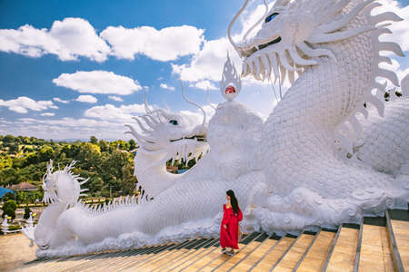 Wat Huay Pla Kang, white big buddha and dragons in Chiang Rai, Chiang Mai province, Thailandの写真素材