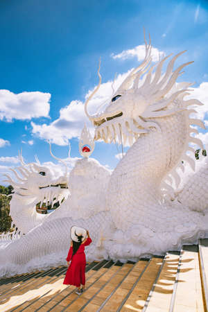 Wat Huay Pla Kang, white big buddha and dragons in Chiang Rai, Chiang Mai province, Thailandの写真素材