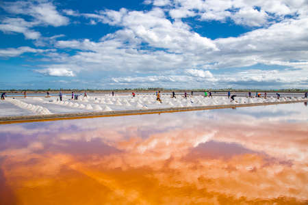 Phetchaburi Salt flats Naklua, farms and farmers collecting salt in Phetchaburi, Thailandの写真素材