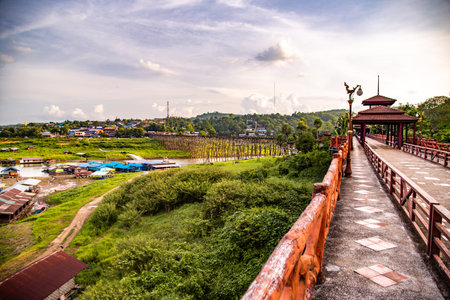 Mon Bridge, old wooden bridge at sunset in Sangkhlaburi, Kanchanaburi, Thailandの写真素材