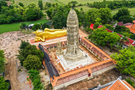 Wat Aranyikawas temple, reclining buddha and pagoda, in Chon Buri, Thailandの写真素材