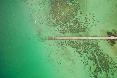 Beautiful tropical island koh Kham, white sand beach with volcanic rocks, near koh Mak, Trat, Thailandの写真素材